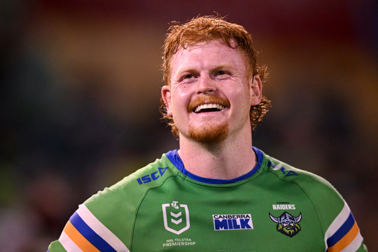Why is this man smiling? We would have thought that was obvious. State of Origin debutant Corey Horsburgh has added a much-needed tinge of ginge to the NRL. (AAP Image/Lukas Coch) 