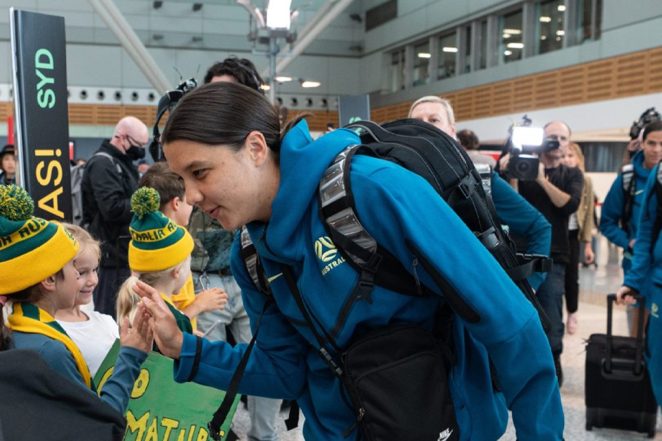 Sam Kerr and the Matildas arrive at Sydney Airport in Sydney, Sunday. (AAP Image/Flavio Brancaleone) 