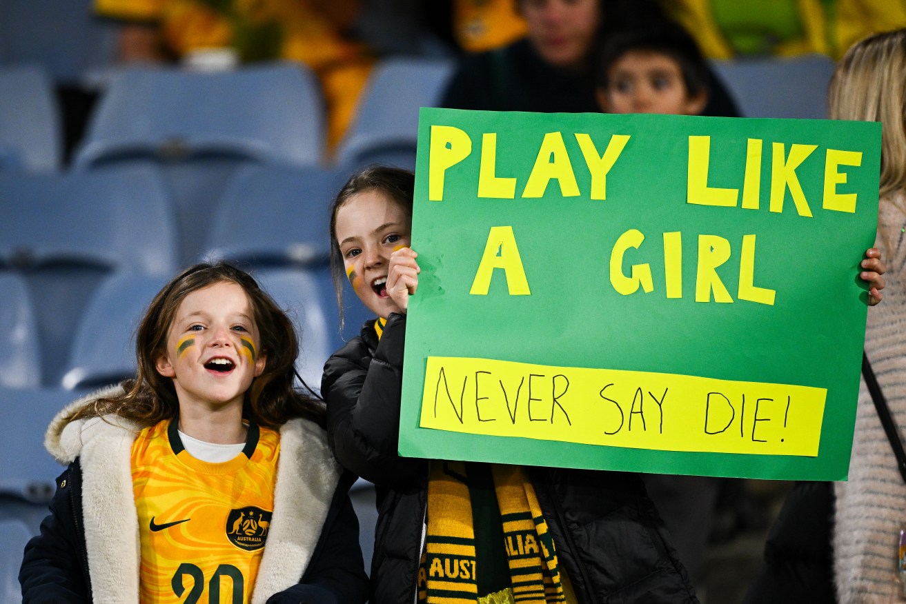 Young Matildas fans show their support ahead of the FIFA Women's World Cup 2023 Semi Final soccer match between Australia and England (AAP Image/Dan Himbrechts) 
