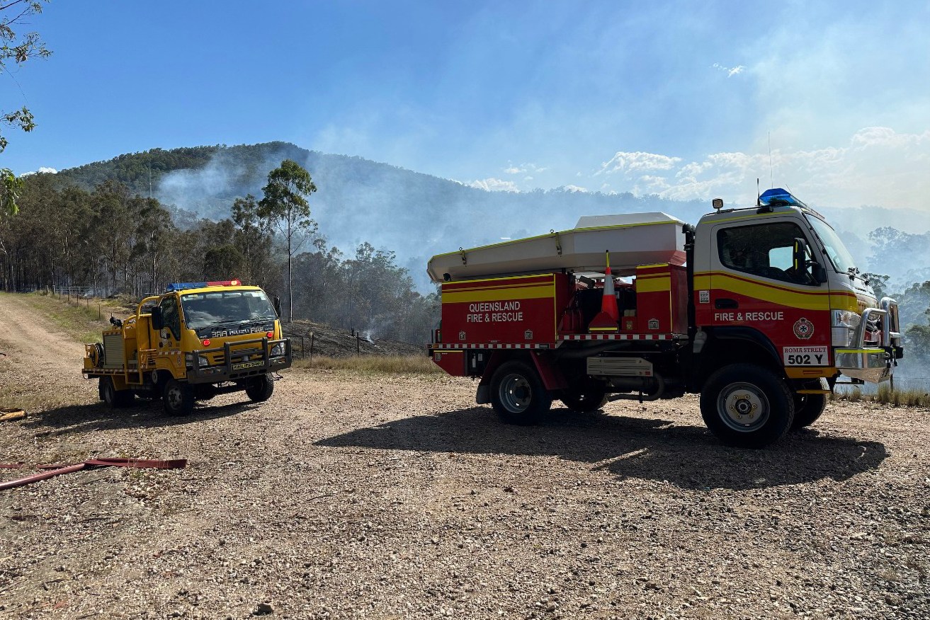  Queensland Fire and Emergency Services (QFES) have been pushed to the limit by hot and windy conditions, but are hoping for a cool change before the weekend. (Image: QFES 