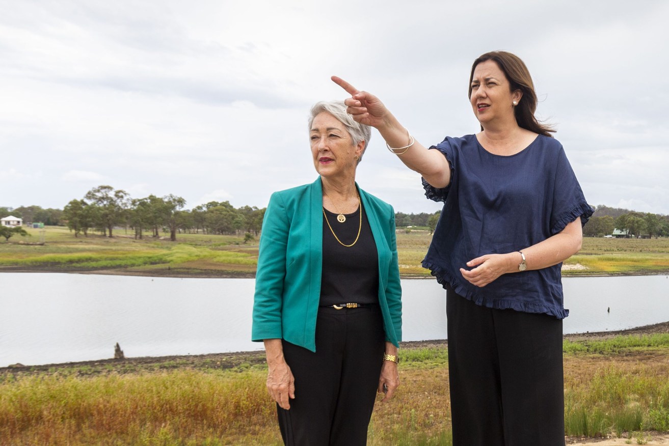 Former Southern Downs Mayor Tracy Dobie (left) and Premier Annastacia Palaszczuk discuss progress on water security for the region at Storm King Dam, Stanthorpe. (AAP Image/Glenn Hunt) 