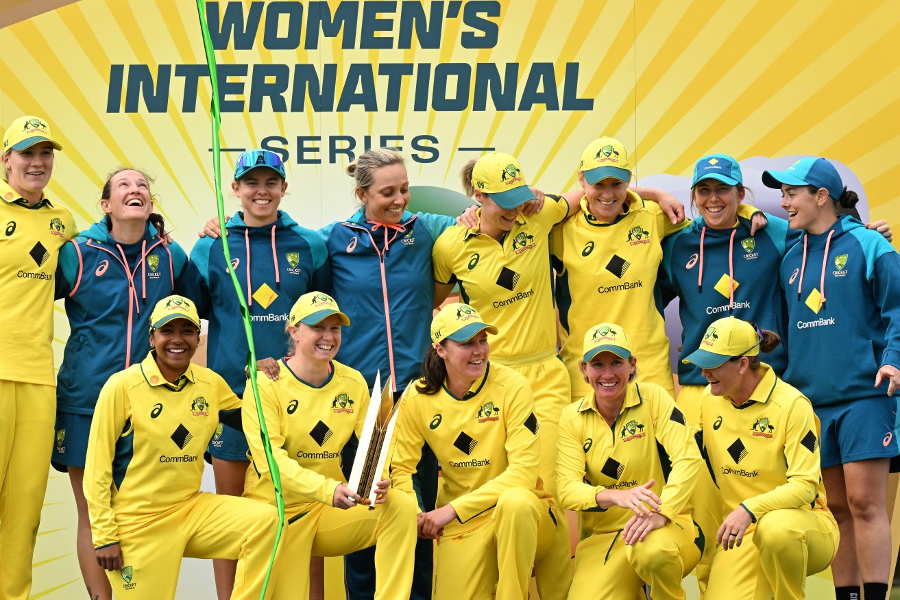 Australian players celebrate winning the Third One Day International (ODI) cricket match between Australia Women and West Indies. (AAP Image/James Ross) 