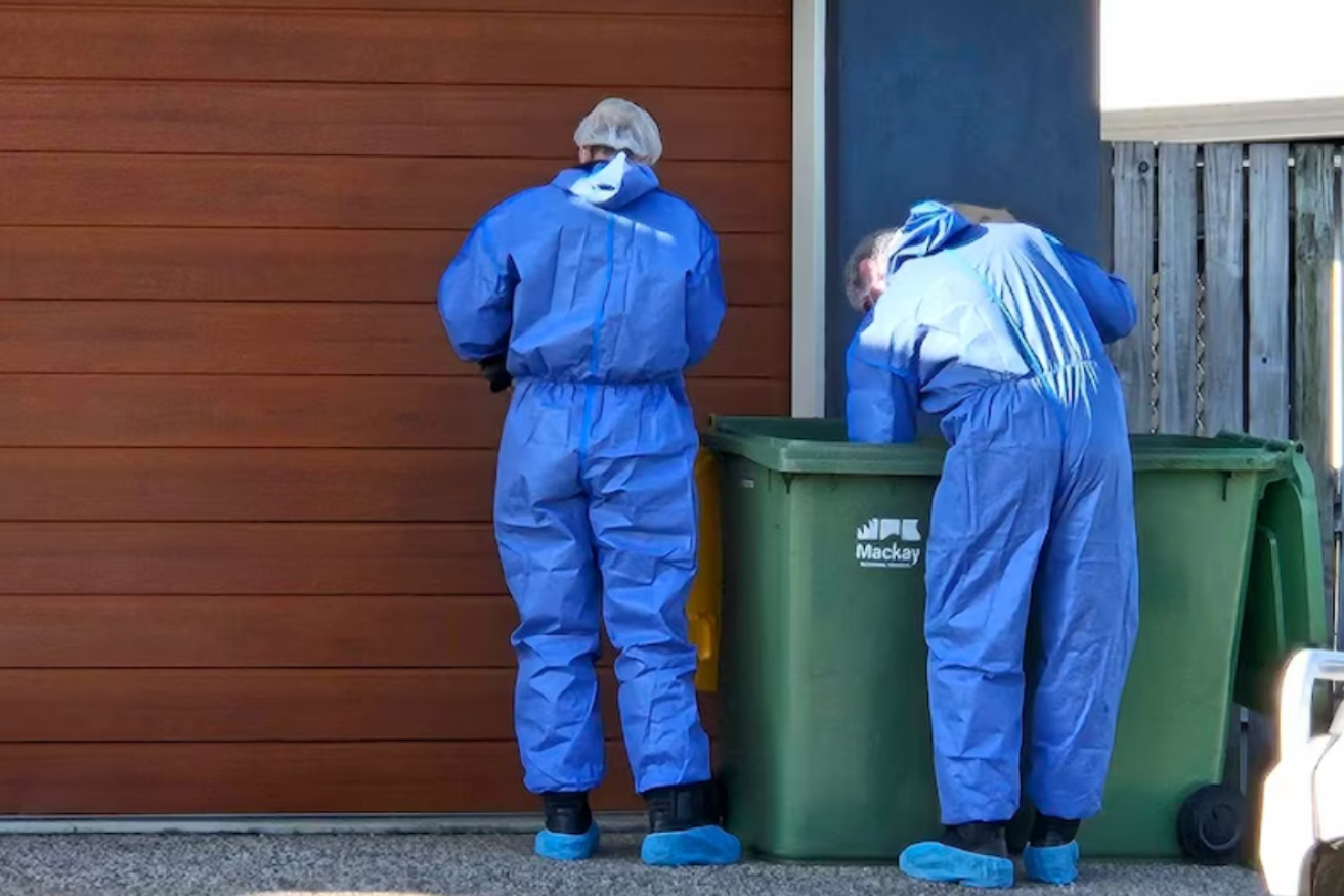 Police search for evidence after called to a Burge Court property on Thursday.(Image: ABC Tropical North: Lillian Watkins)