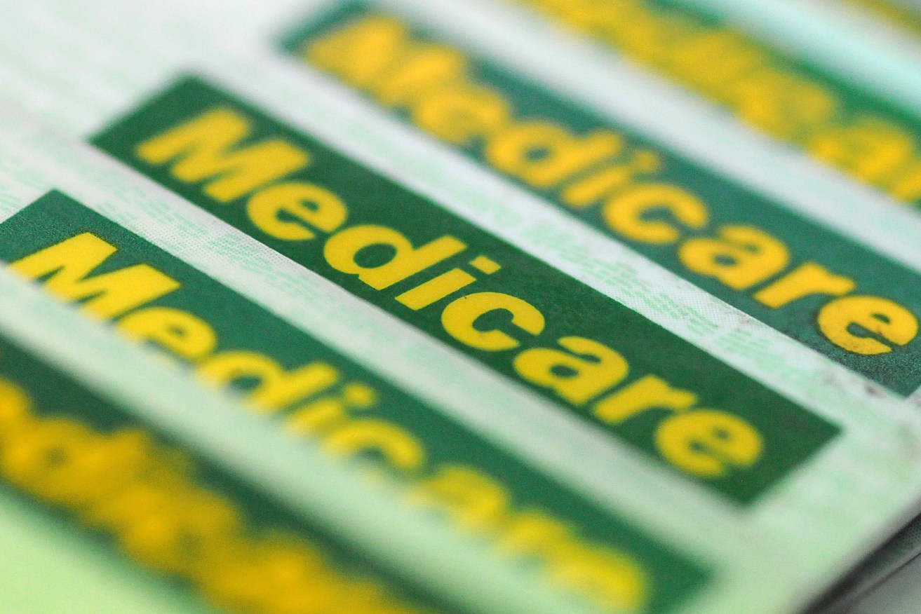 Millions of Australians may bet a big Christmas bonus from Medicare.  (AAP Image/Dave Hunt) NO ARCHIVING