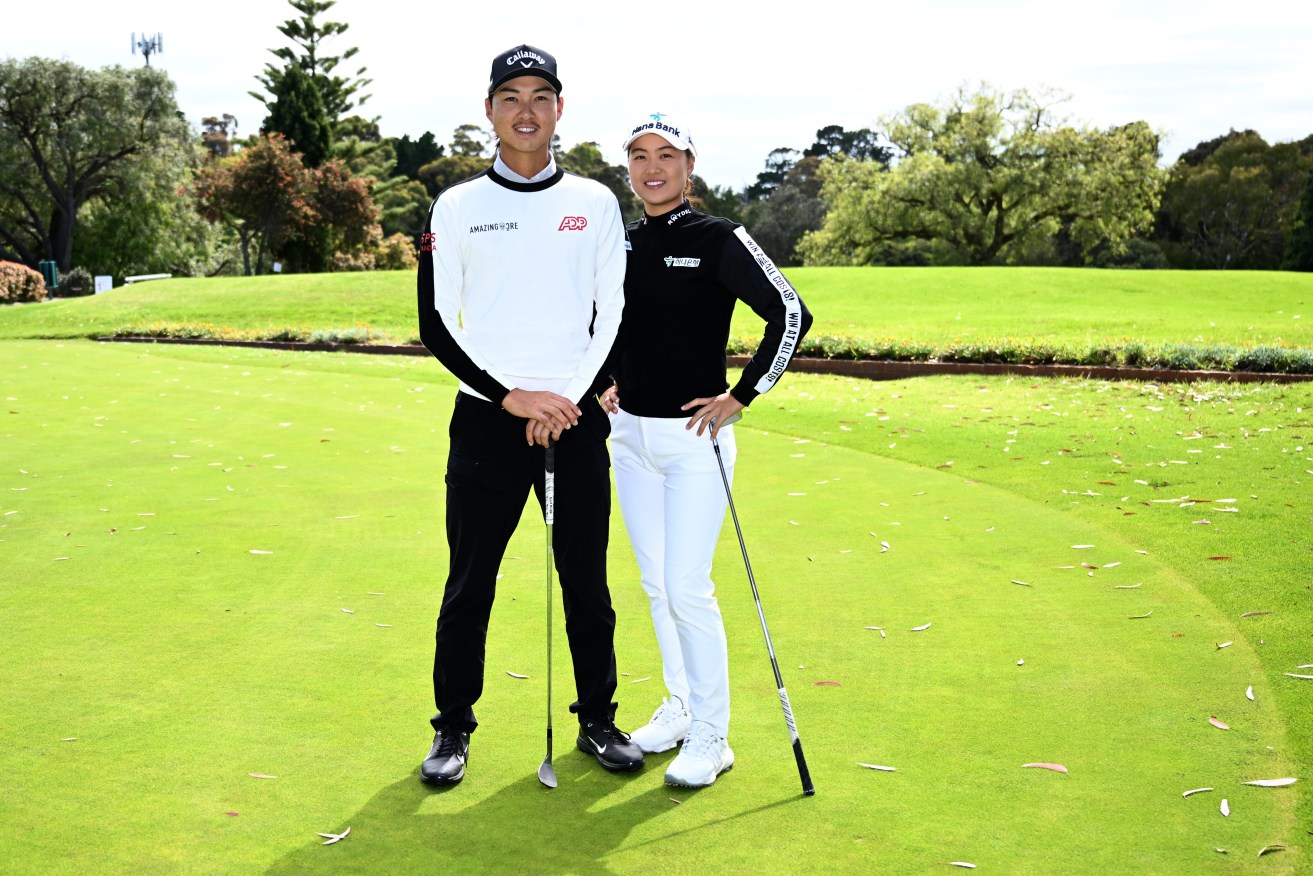 Minjee Lee  (right) and her younger brother Min Woo Lee   (AAP Image/Joel Carrett) 