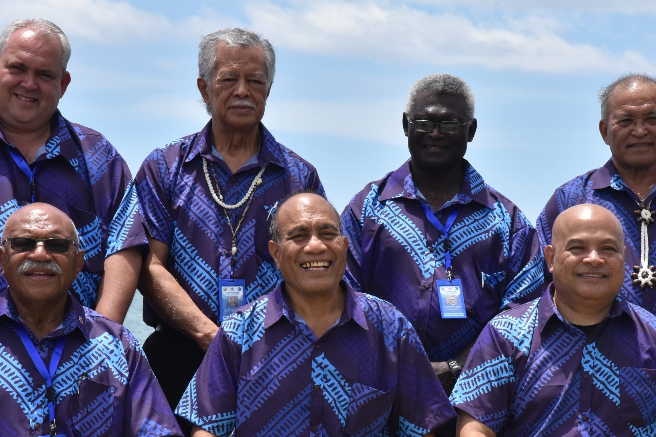 Pacific leaders pose for the Pacific Islands Forum special leaders retreat 'family photo' at Nadi's Sheraton Fiji Golf and Beach Resort in Nadi, Fiji, Friday, February 24. (AAP Image/Ben McKay) 