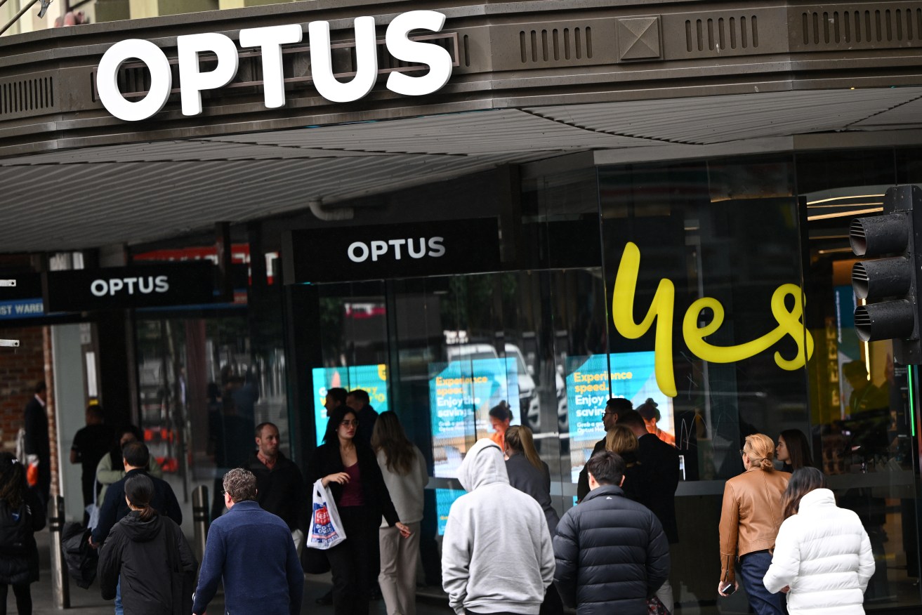 Signage at an Optus retail store in Melbourne, Thursday, August 31, 2023. (AAP Image/Joel Carrett) 