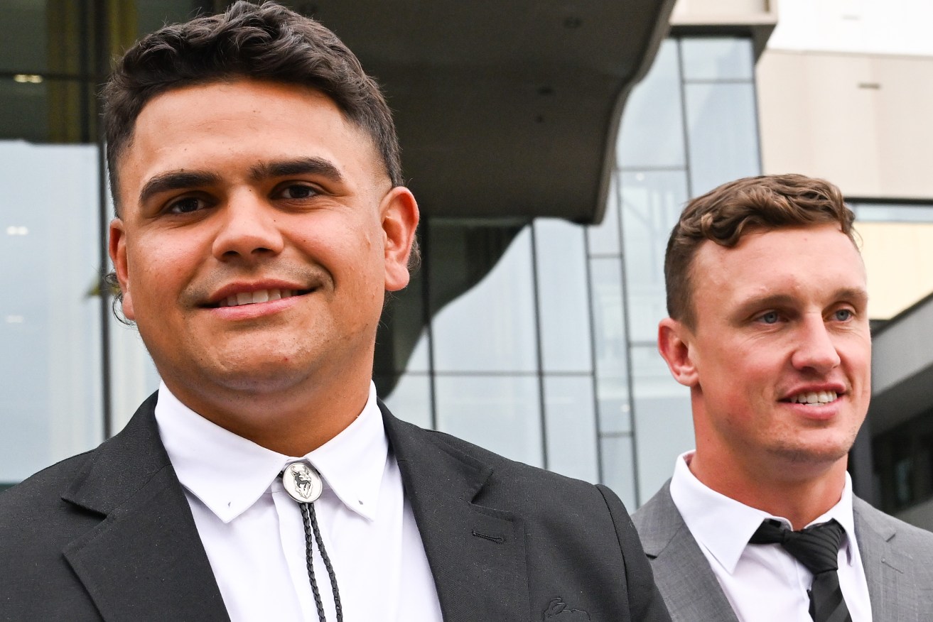 South Sydney Rabbitohs player Latrell Mitchell and Canberra Raiders player Jack Wighton leave the ACT Magistrates Court. (AAP Image/Lukas Coch) 