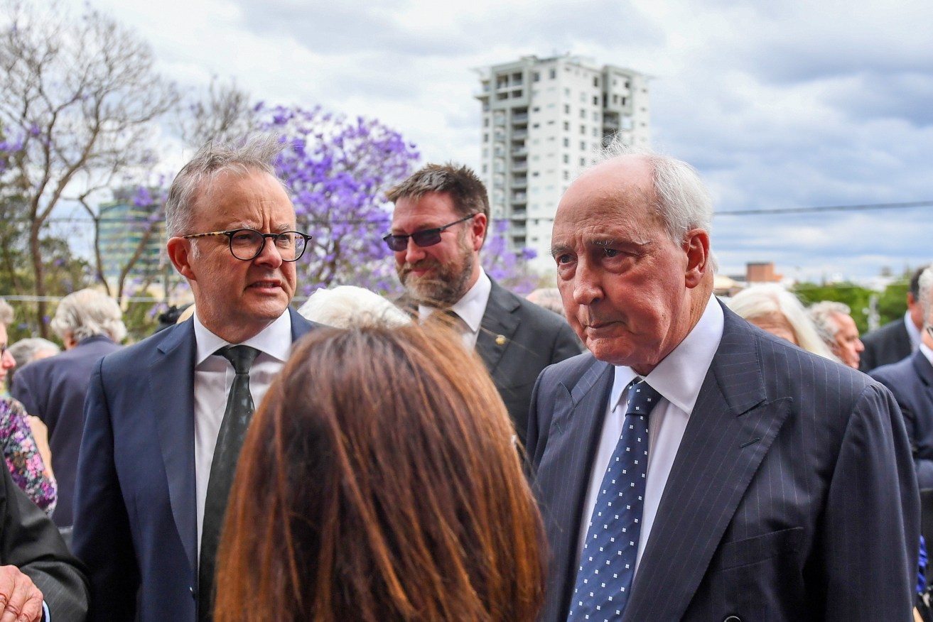 Prime Minister Anthony Albanese (left) speaks with former Prime Minister Paul Keating during a state funeral for Bill Hayden at St Mary's Catholic Church, in Ipswich, QLD, Friday. Former governor-general, Labor leader and architect of universal healthcare Bill Hayden is set to be farewelled at a state funeral. (AAP Image/Jono Searle) 