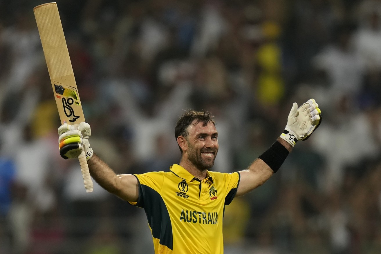 Australia's Glenn Maxwell celebrates after their win in the ICC Men's Cricket World Cup match against Afghanistan in Mumbai, India, Tuesday, Nov. 7, 2023. (AP Photo/Rajanish Kakade)