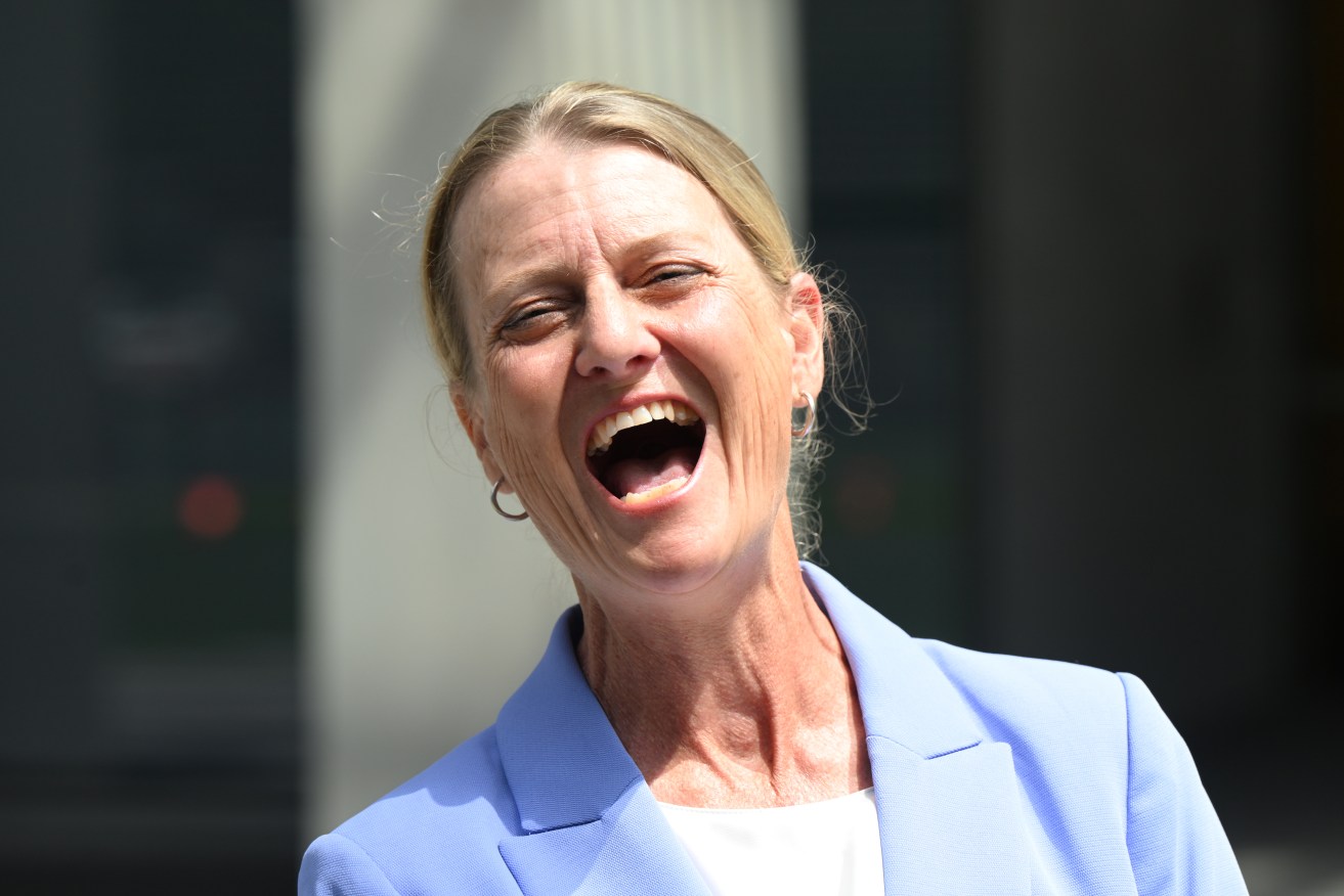 Former Capalaba LNP candidate Bev Walters is seen outside the Supreme Court in Brisbane. Walters has succeeded in her defamation proceedings against Don Brown, who is the MP for Capalaba. (AAP Image/Darren England) 