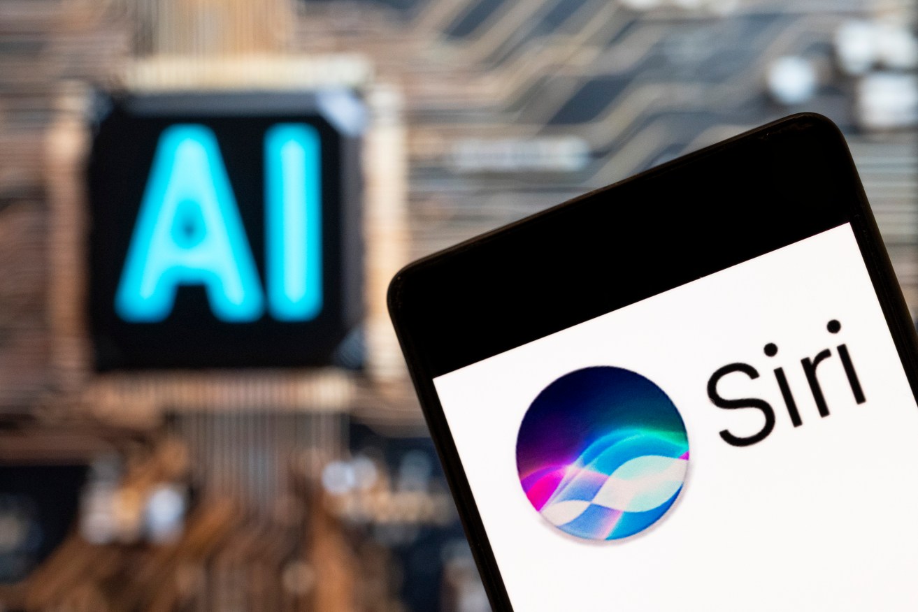 In this photo illustration, the digital assistant owned by Apple, Siri, logo seen displayed on a smartphone with an Artificial intelligence (AI) chip and symbol in the background. (Photo by Budrul Chukrut / SOPA Images/Sipa USA) *** Strictly for editorial news purposes only ***