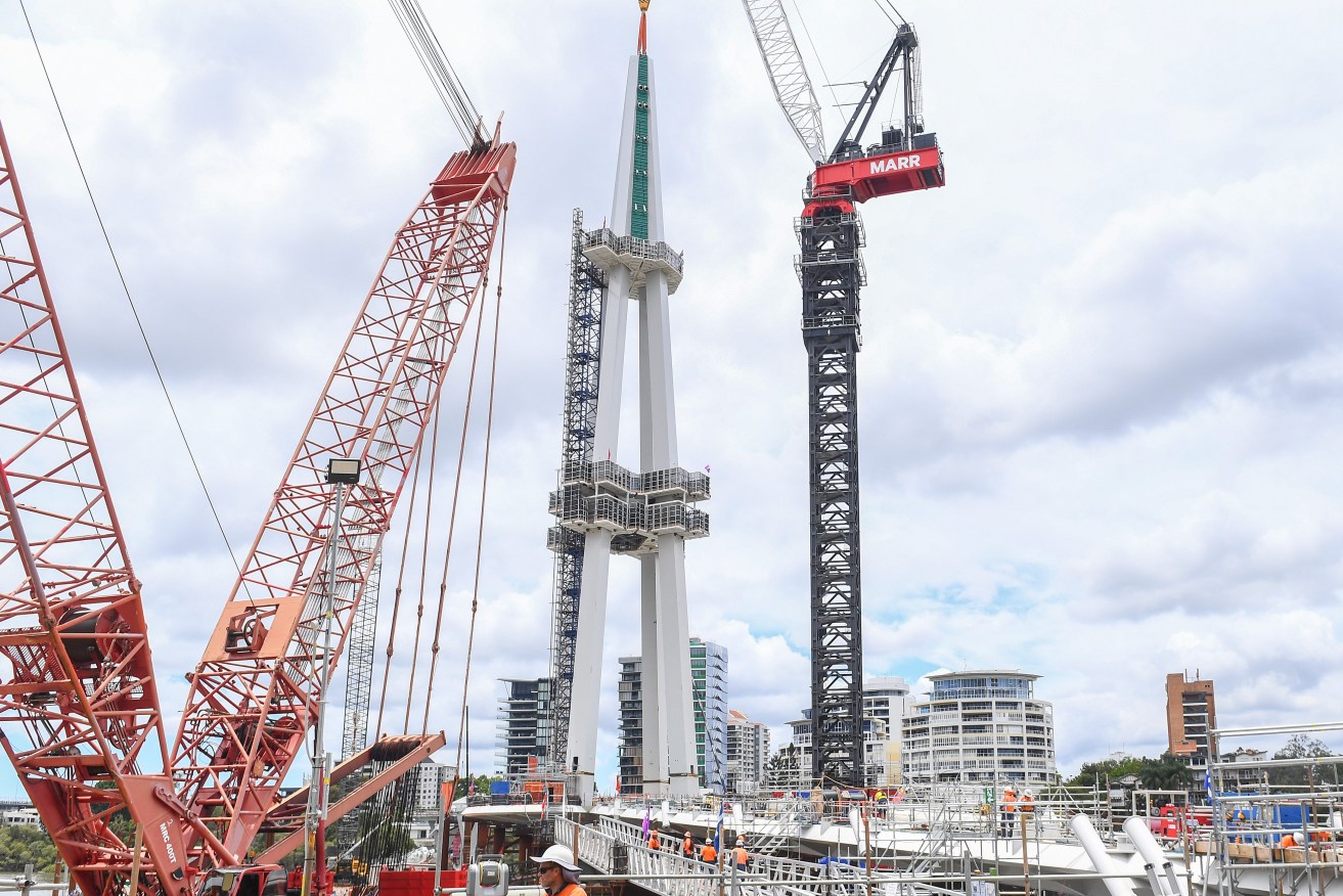 A masthead of the Kangaroo Point Green Bridge (right) is seen recently installed in Brisbane, Wednesday, November 29, 2023. (AAP Image/Jono Searle) 