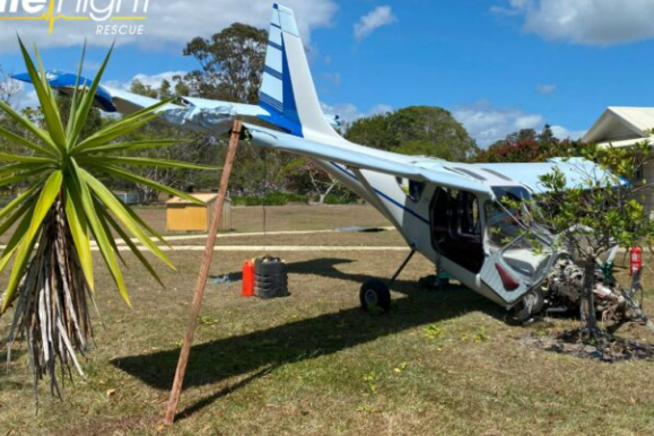 The light plane which cartwheeled while trying to land on a grass airstrip near the hinterland town of Cootharaba on Sunday. (IMAGE:Supplied RACQ Life Flight).