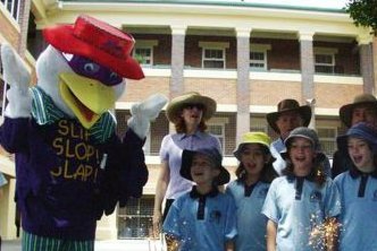 Brisbane, November 18, 2002. Slip, Slop, Slap skin cancer prevention campaign mascot "Sid the Seagull" celebrates his 21st birthday with students from West End State School. (AAP Image/Gillian Ballard) 
