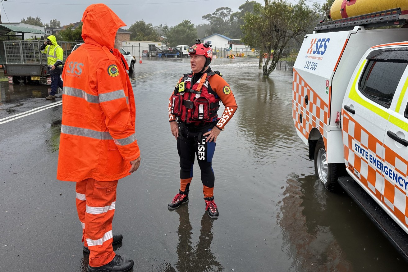 NSW SES Flood Rescue Technicians at Lake Conjola on the NSW South Coast on Wednesday November 29, 2023. State Emergency Services have responded to hundreds of calls as parts of NSW and Victoria were battered by wild weather. (AAP Image/Supplied by NSW SES) 
