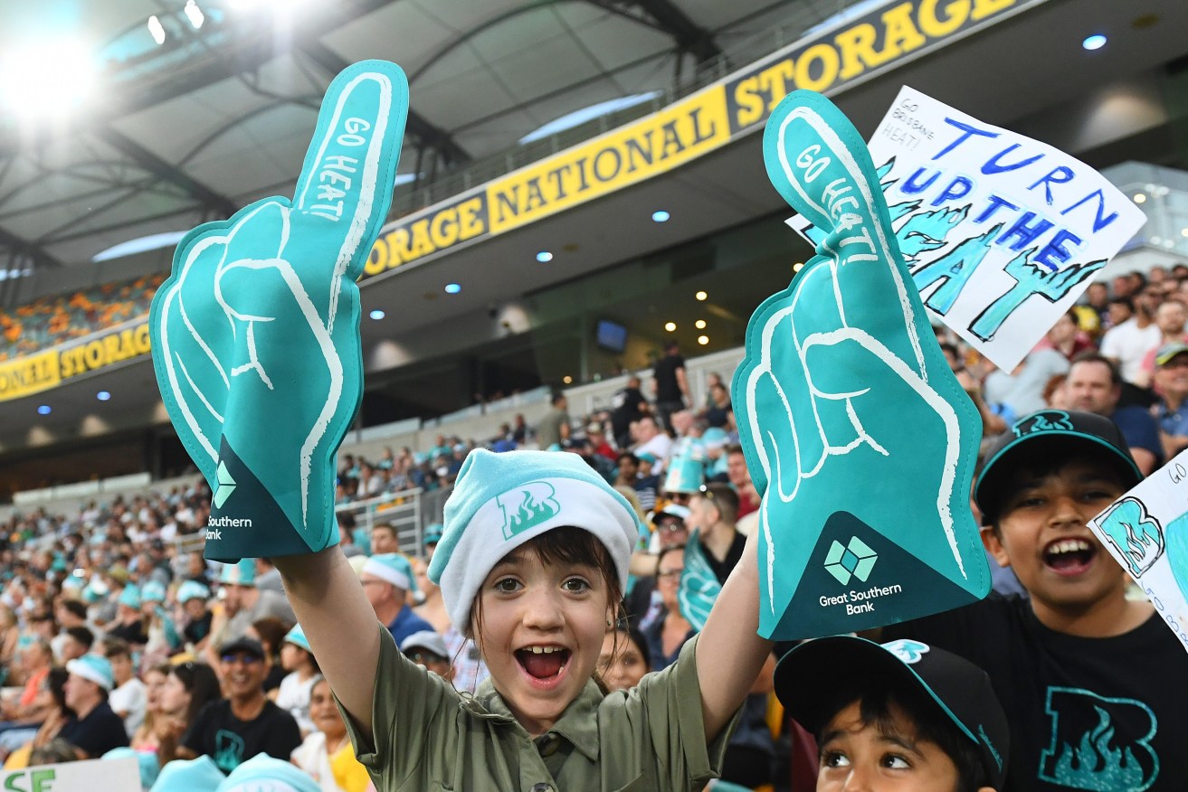 Young fans turned up in their droves for  BBL Round 1 match between the Brisbane Heat and the Melbourne Stars at the Gabba  (AAP Image/Jono Searle) 