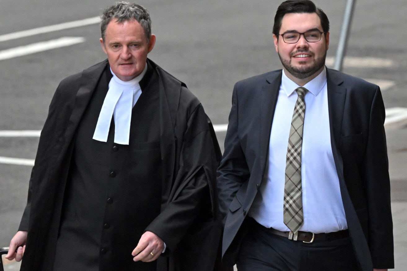 Lawyer Steven Whybrow (left) and former Liberal staffer Bruce Lehmann arrive at the Federal Court of Australia in Sydney. (AAP Image/Mick Tsikas) 
