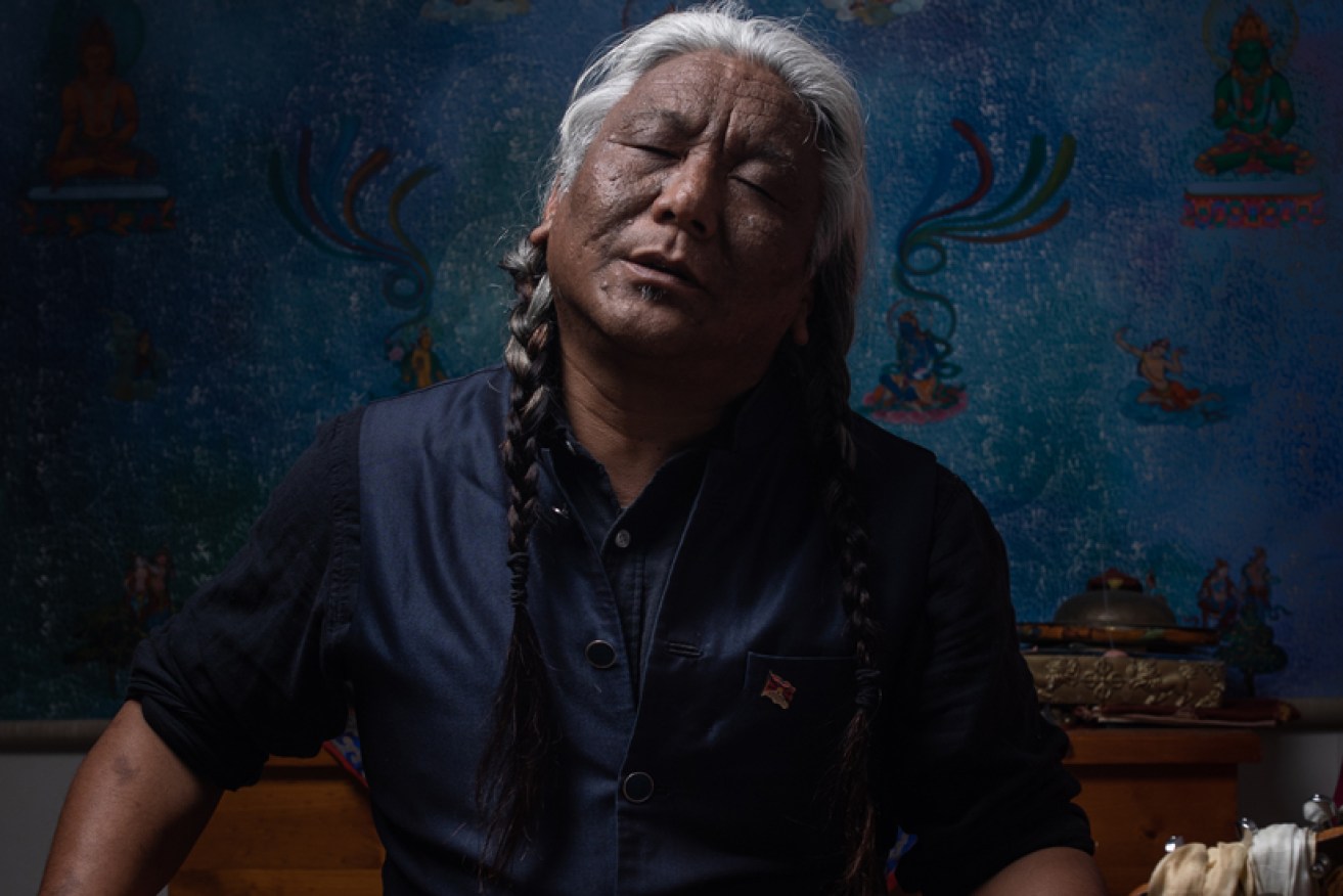 Musician Tenzin Choegyal (pictured) and the Monks of Tibet will lead a 4am sunrise ritual on New Year's morning at the upcoming Woodford Folk Festival.
