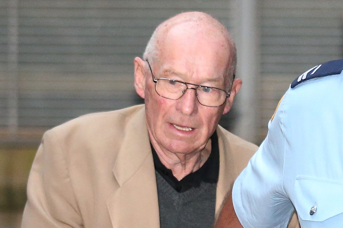 Former Detective Roger Rogerson is led to a prison van at the NSW Supreme Court in Sydney, Friday, June 3, 2016. Rogerson and Glen McNamara have both pleaded not guilty to murdering 20-year old student Jamie Gao in May 2014. (AAP Image/David Moir) 