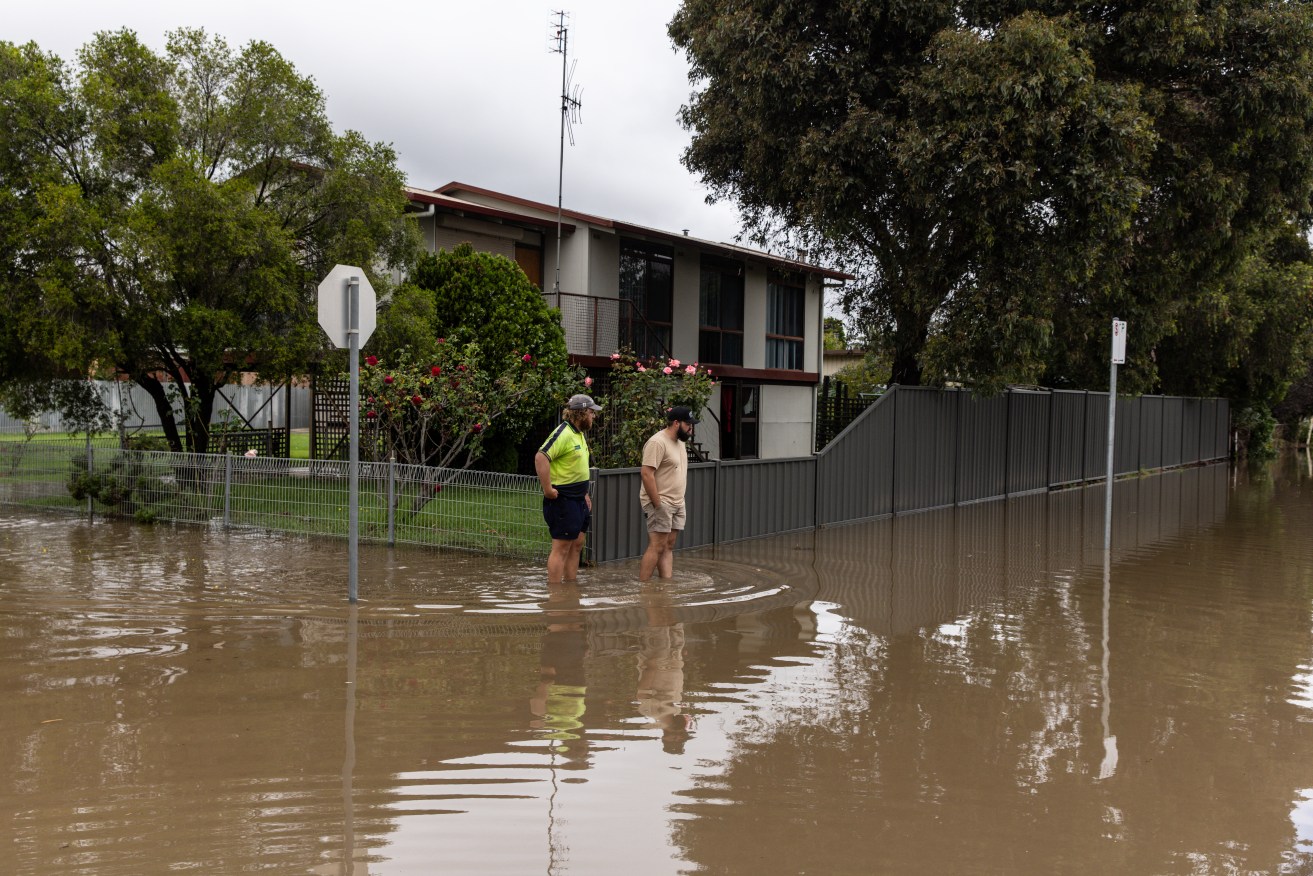Floodwater is seen in the centre of Seymour on Monday, January 08, 2024. Thunderstorms and heavy rain have hit parts of Victoria, South Australia and NSW with residents making hundreds of calls for help amid flooding. (AAP Image/Diego Fedele) NO ARCHIVING