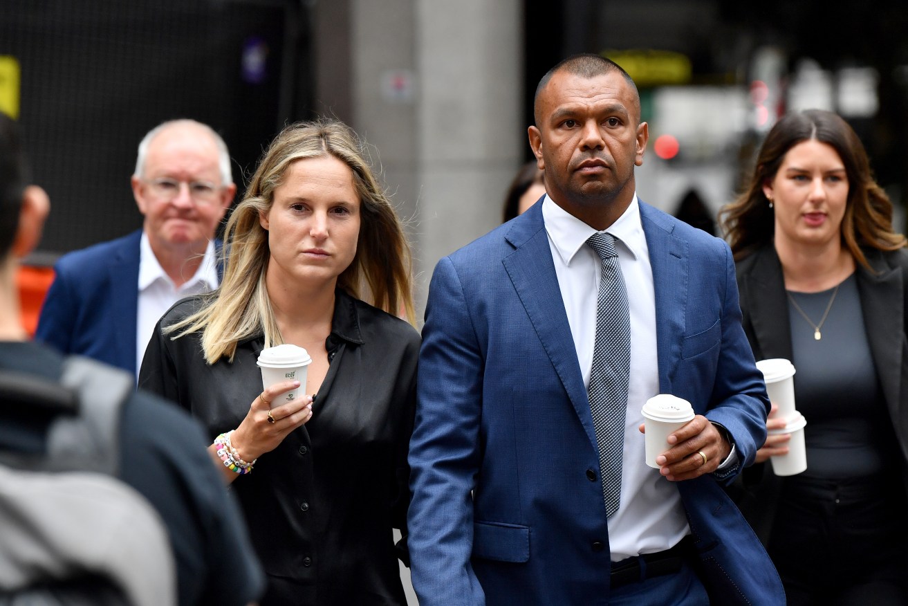 Kurtley Beale (right) arrives at the Downing Centre District Court in Sydney, Tuesday, with his legal team (AAP Image/Bianca De Marchi) 