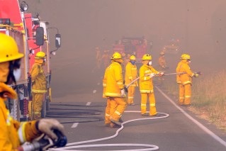 Two houses saved from bushfires by intense overnight firefight