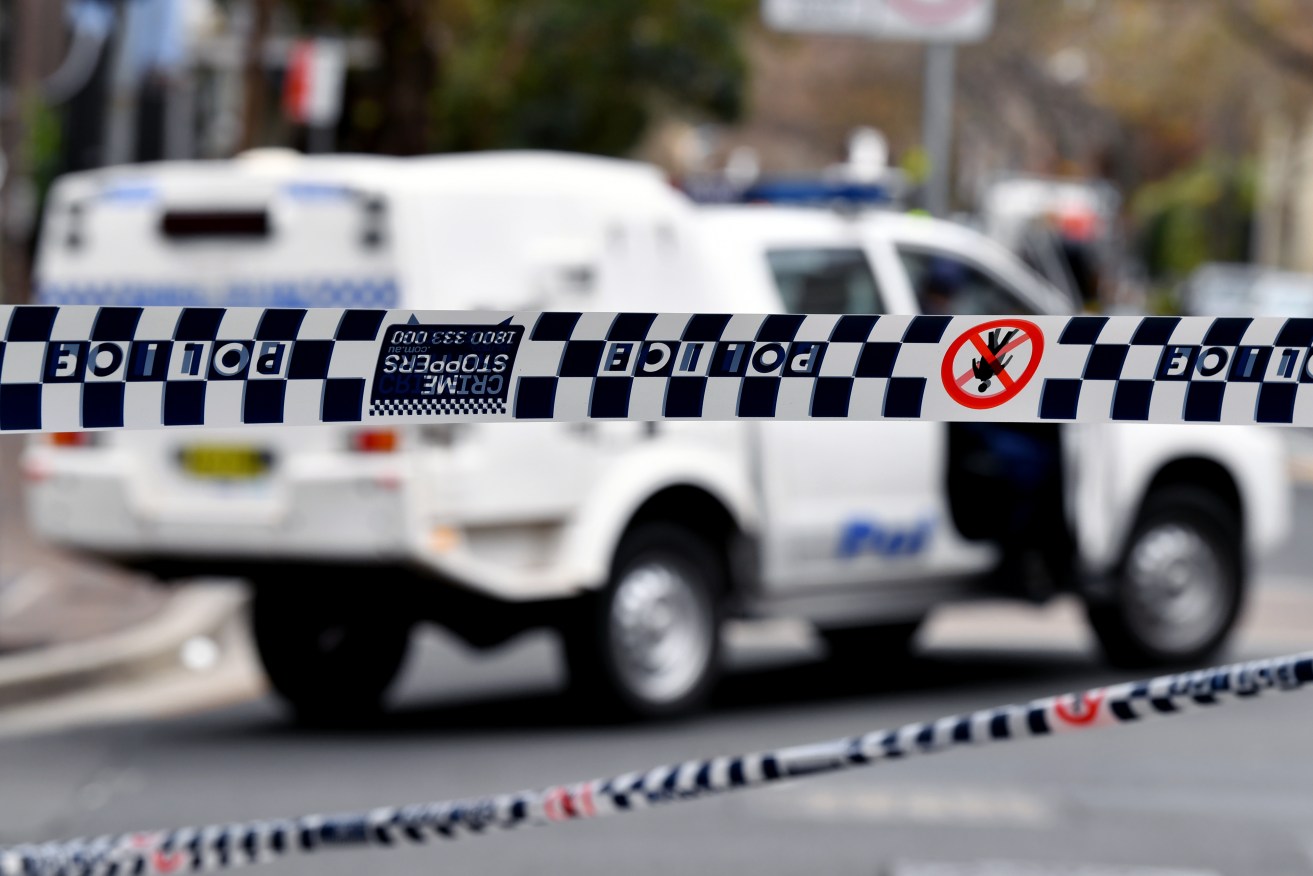 Police have arrested a second man over the knifing murder of a man in a Gold Coast car park. (AAP Image/Joel Carrett) 