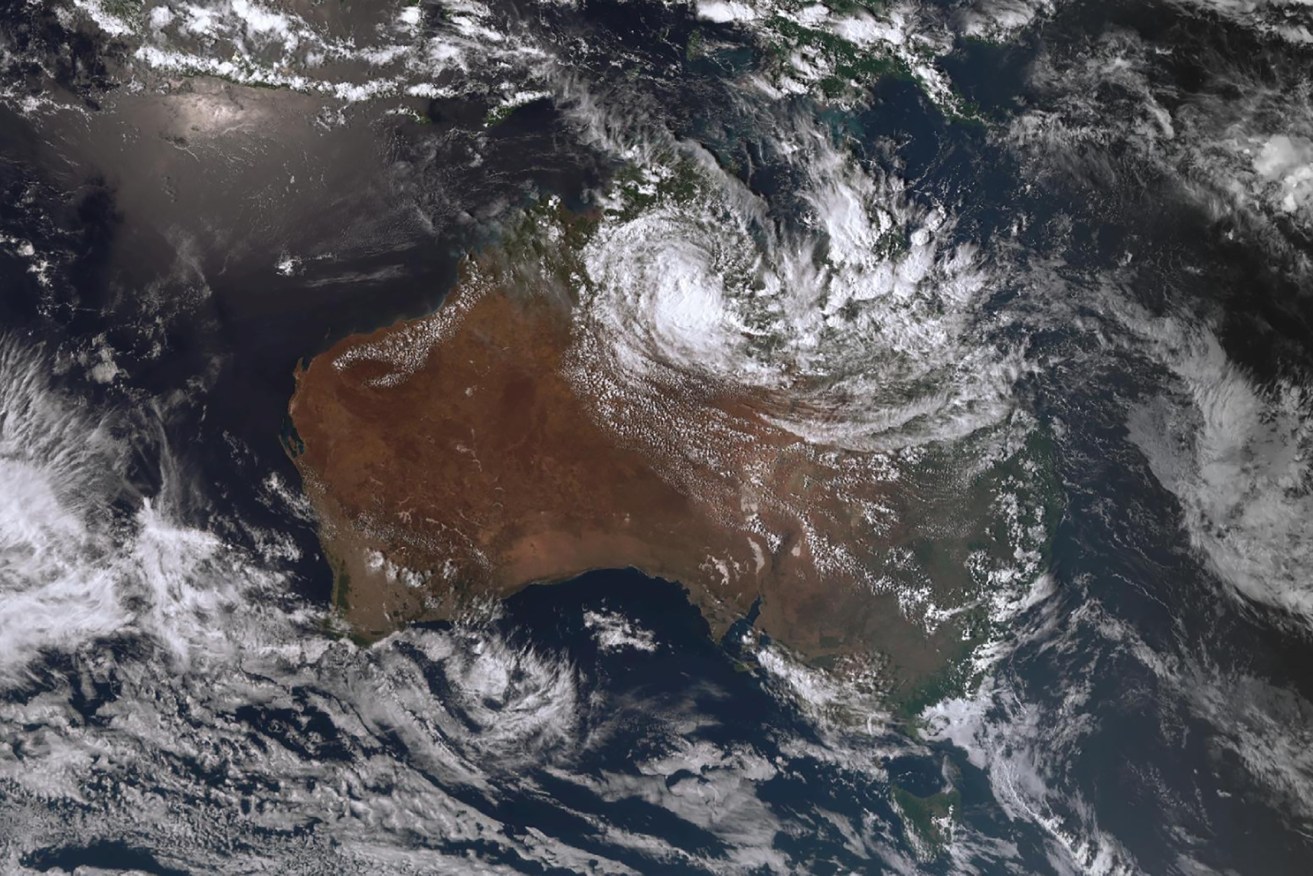 A supplied satellite image obtained on Saturday, February 17, 2024, of ex-Tropical Cyclone Lincoln moving across northern Australia. Ex-Tropical Cyclone Lincoln will continue to bring rain and flooding to the NT and Queensland over the coming days. (AAP Image/Supplied by Bureau Of Meteorology) 