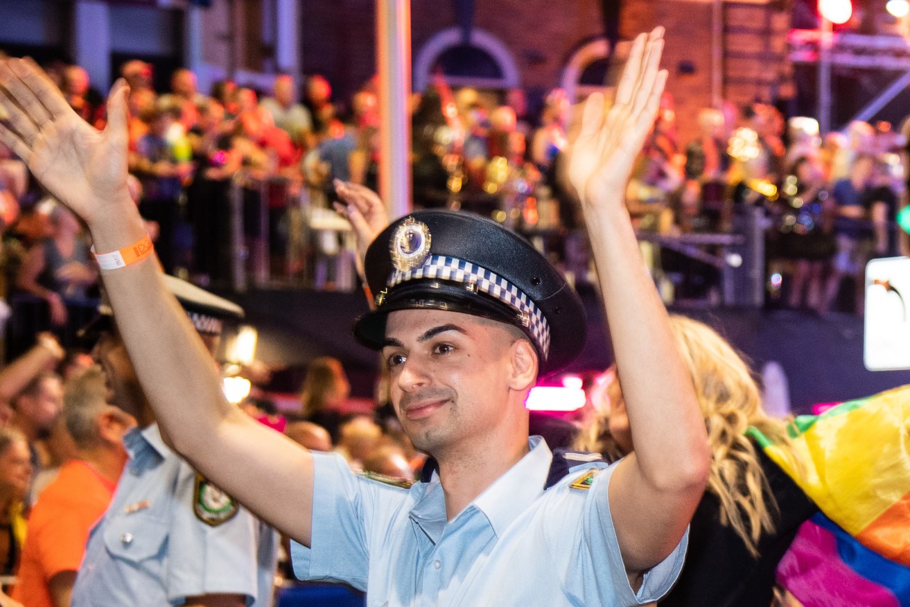  Constable Beau Lamarre taking part in the 42nd annual Gay and Lesbian Mardi Gras parade in Sydney. Lamarre, a celebrity blogger turned NSW police officer, has been charged with the alleged murder of AFL goal umpire and former Network Ten reporter Jesse Baird, 26, and his Qantas flight attendant boyfriend Luke Davies, 29. (AAP Image/James Gourley) 