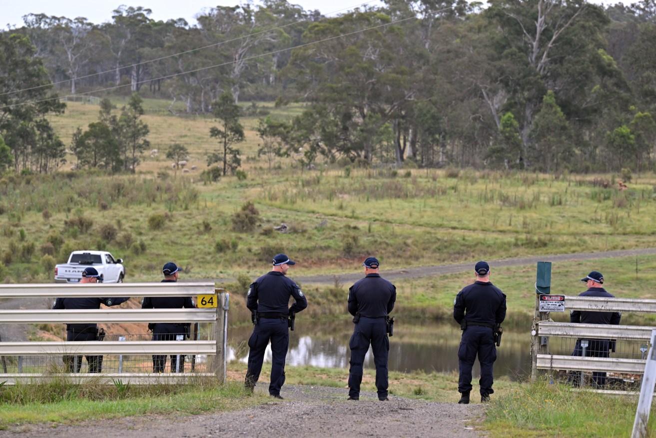  Police divers have been sent to the Southern Tablelands, southwest of Sydney, as the search for the bodies of Jesse Baird and Luke Davies continues. (AAP Image/Mick Tsikas) 