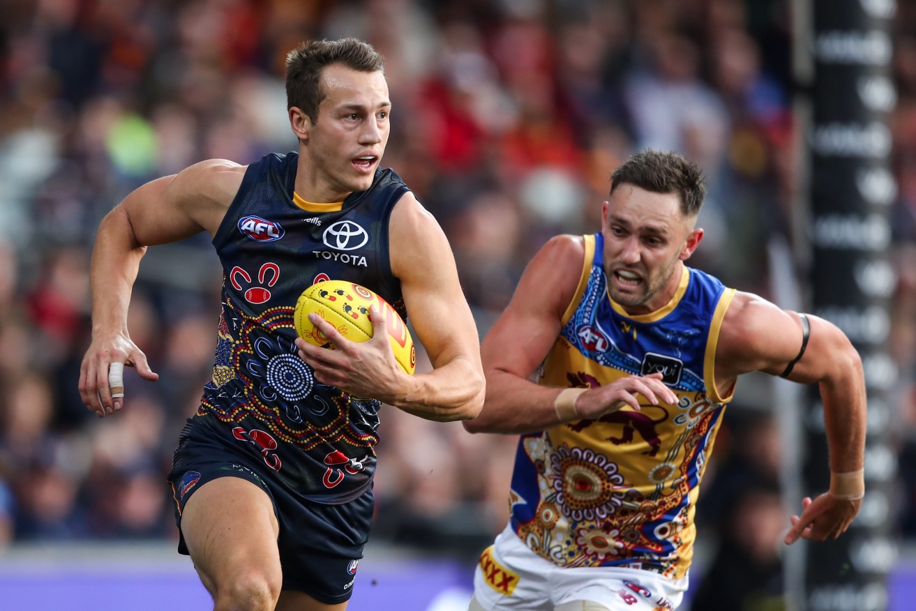 Tom Doedee of the Crows during the AFL Round 11 match between the Adelaide Crows and the Brisbane Lions at Adelaide Oval. After joining the Lions this year Doedee has suffered a recurrence of his knee injury (AAP Image/Matt Turner) 