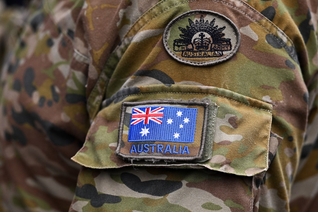 Detail of an Australian flag pictured on the uniform of Australian Army personnel on assignment to the Gold Coast, Tuesday, January 9, 2024.  (AAP Image/Dave Hunt) NO ARCHIVING