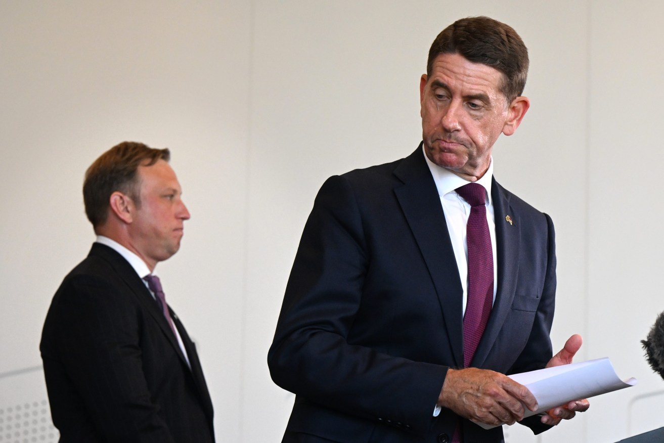 Queensland Premier Steven Miles (left) and Treasurer Cameron Dick (right) speak to media during a press conference in Brisbane, Monday, January 22, 2024. (AAP Image/Darren England) NO ARCHIVING