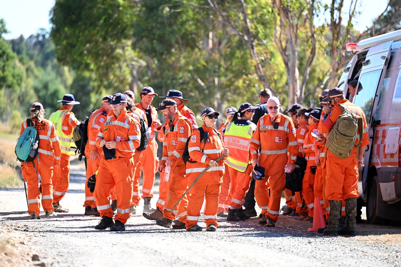 SES personnel are seen at a staging area along Somerville road in Buninyong near Ballarat,  Friday, February 9, 2024. Police are keeping up the scale of their search for missing 51-year-old Ballarat mother Samantha Murphy, appealing for dashcam vision in the area. (AAP Image/James Ross) NO ARCHIVING