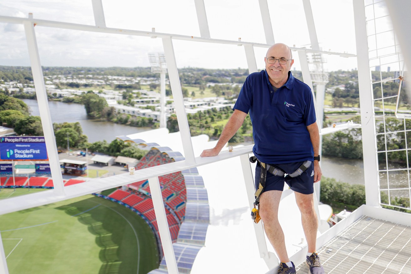  People First Bank chief executive Peter Lock poses at the newly renamed People First Bank stadium on the Gold Coast. (AAP Image/Supplied) 
