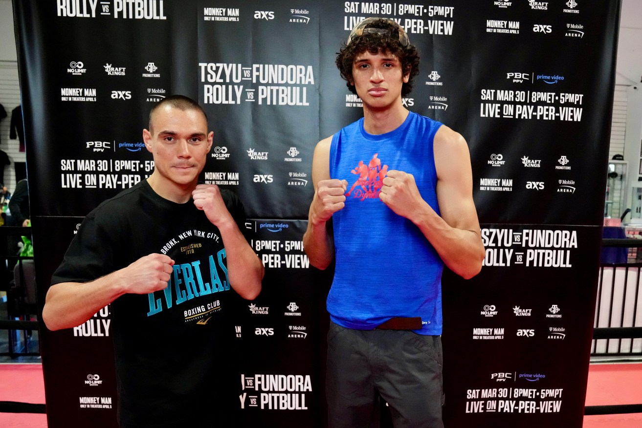 Australia’s Tim Tszyu (left) and Sebastian Fundora of USA  pose during an open media workout in Las Vegas, Nevada, United States, Thursday, March 21, 2024. (AAP Image/Supplied by TGB Promotions, Sean Michael Ham)