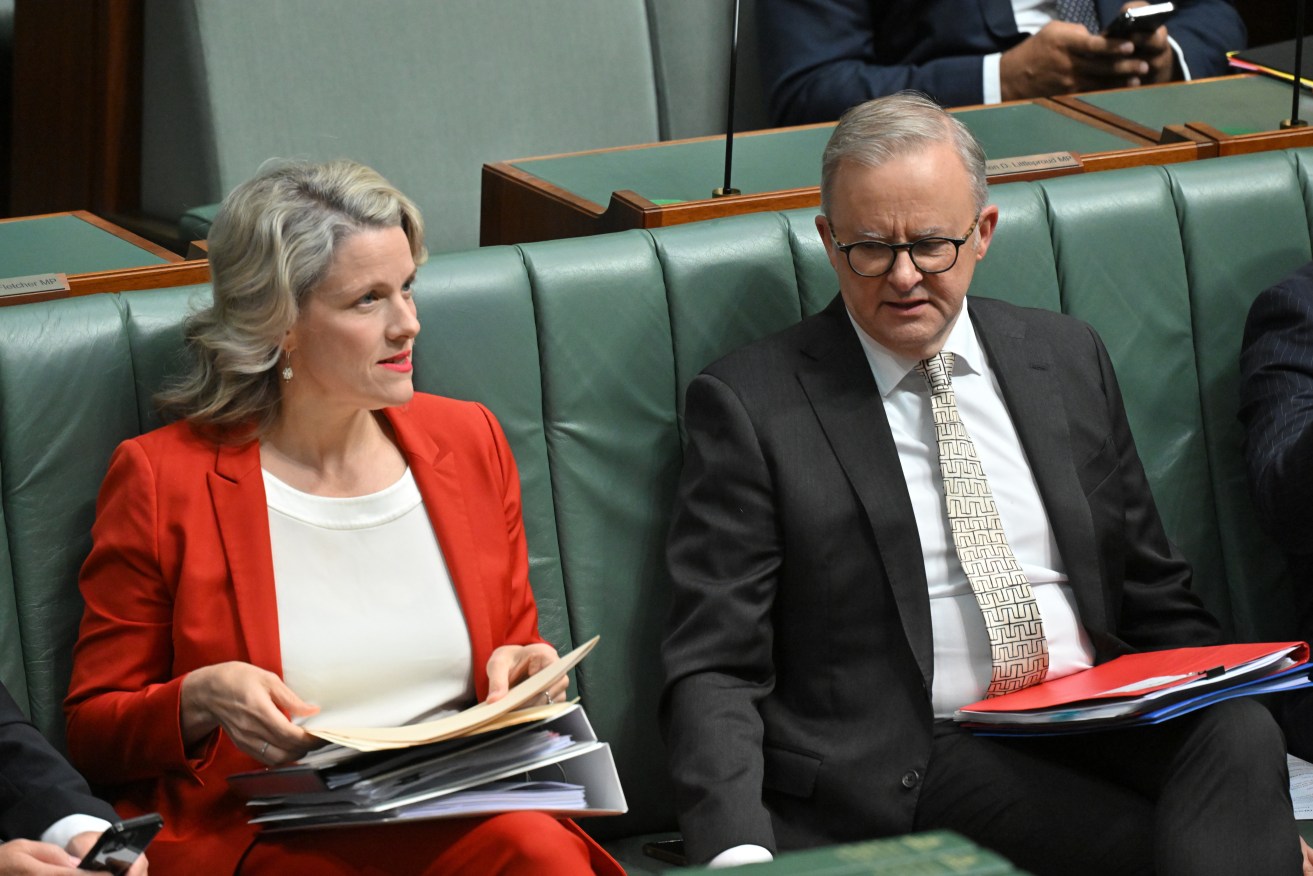 Minister for Home Affairs Clare O’Neil and Prime Minister Anthony Albanese during a division in the House of Representatives at Parliament House in Canberra, Tuesday, March 26, 2024. (AAP Image/Mick Tsikas) 