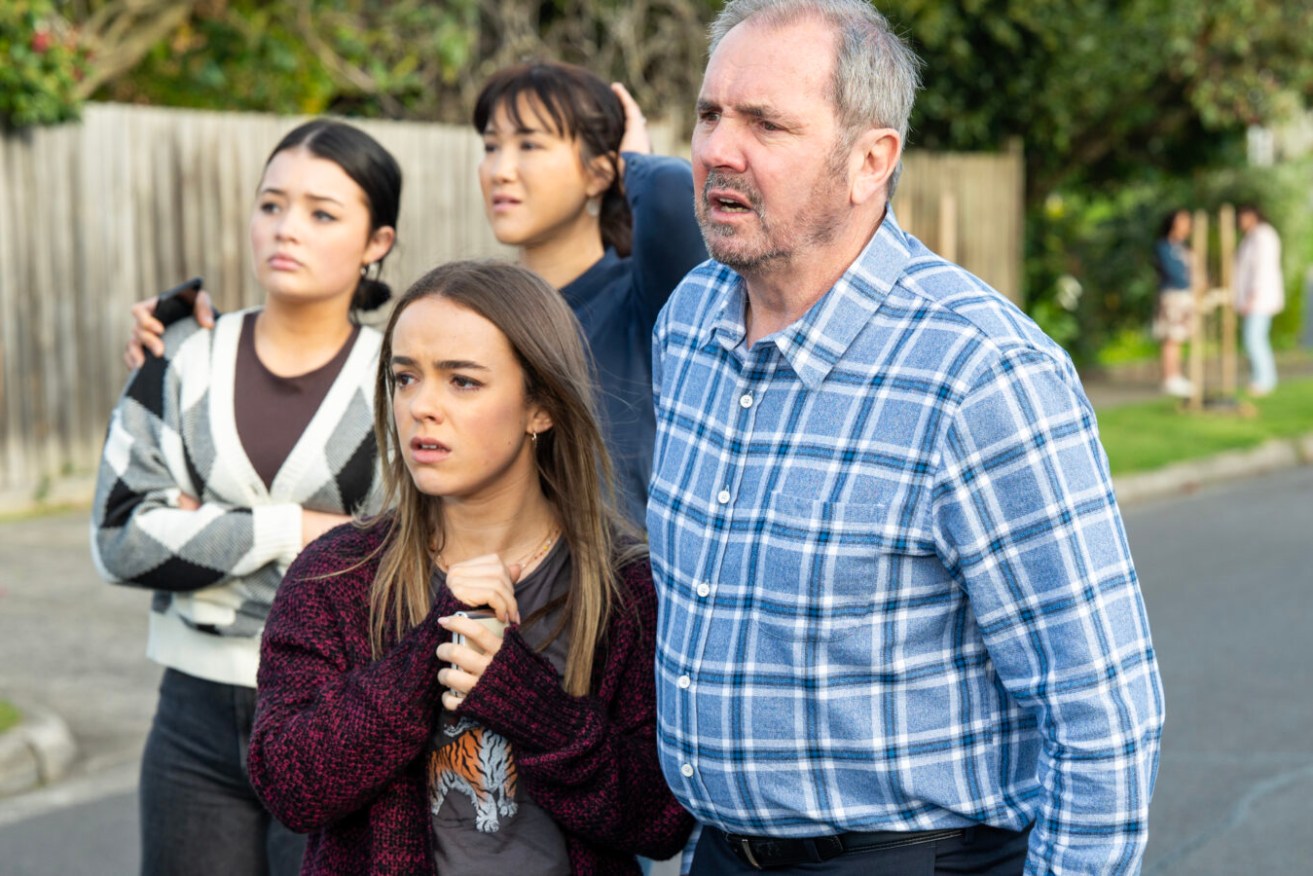 A scene from Neighbours with Sadie Rodwell ( Emerald Chan), Wendy Rodwell (Candice Leask) and Holly Hoyland (Lucinda Armstrong Hall) and Karl Kennedy (Alan Fletcher). Photo: Ray Messner