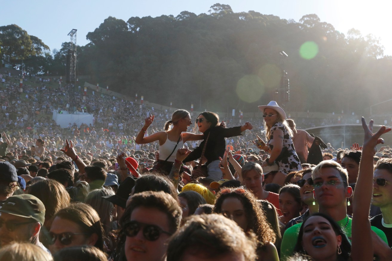 Punters enjoy Australian rock band Wolfmother at Splendour in the Grass music festival in Byron Bay, Friday, July 19, 2019. (AAP Image/Regi Varghese) 