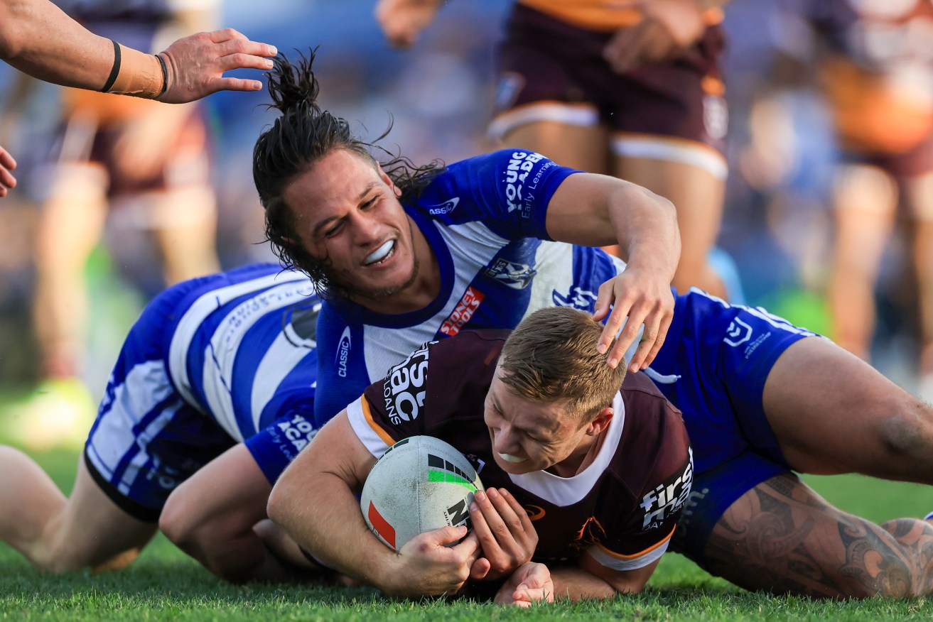 Jackson Topine of the Bulldogs during the match between the Canterbury Bankstown Bulldogs and the Brisbane Broncos at Belmore Sportsground. (He is now taking legal action against the club over claims his training was "illegal corporal punishment'.AAP Image/Mark Evans) 