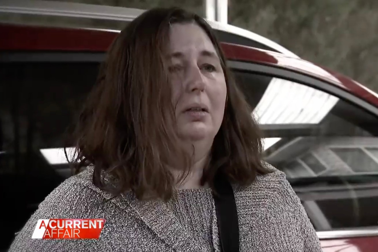 A supplied TV screengrab obtained on Friday, November 3, 2023, of Erin Patterson speaking to a reporter outside her home in Leongatha, Victoria. Erin Patterson, 49, has been charged with murder, about three months since three people died from suspected mushroom poisoning. (AAP Image/Supplied by Nine News) 