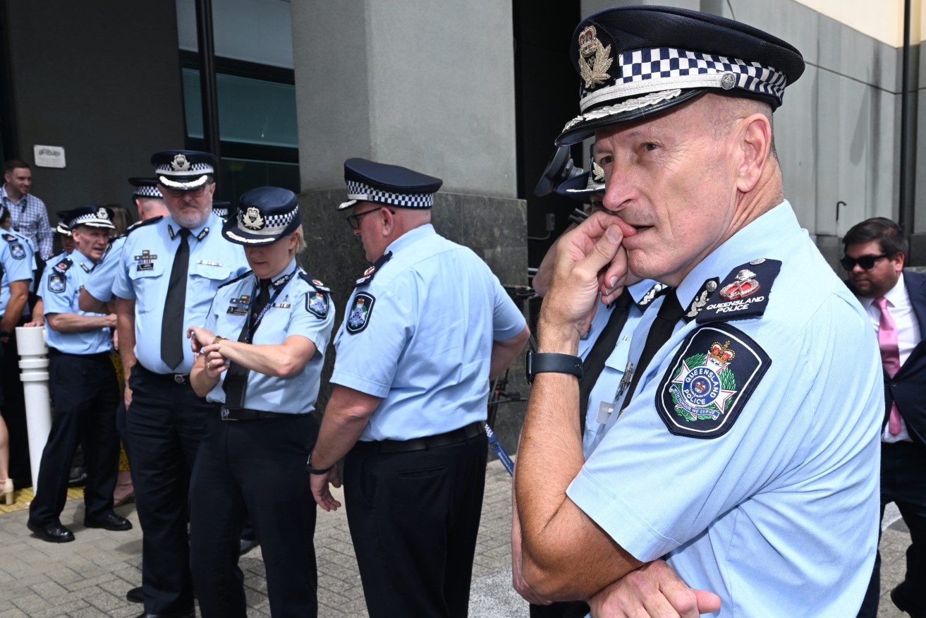 Queensland police commissioner Steve Gollschewski (right) is seen at the ceremony for outgoing Queensland Police Commissioner Katarina Carroll at Queensland Police Service (QPS) Headquarters (AAP Image/Darren England) 