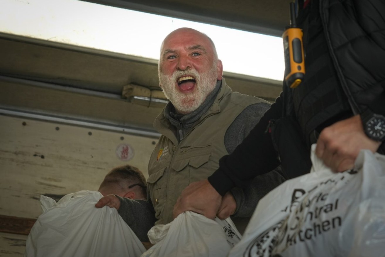 FILE - Jose Andres, a Spanish chef, and founder of World Central Kitchen unloads the humanitarian food packages. World Central Kitchen, called a halt to its work in the Gaza Strip after an apparent Israeli strike killed seven of its workers, including one Australian. (AP Photo/Efrem Lukatsky, File)