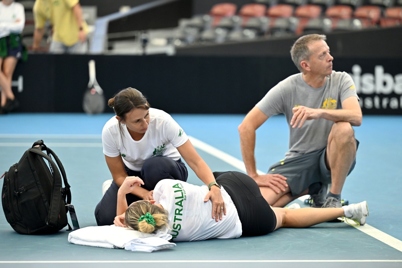A supplied image shows Storm Hunter of Australia injured on court during a practice session for the Billie Jean King Cup Qualifier at the Queensland Tennis Centre in Brisbane on Thursday, April 11, 2024. Storm Hunter has torn her achilles in a brutal injury setback during an Olympic year. (AAP Image/Supplied by Chloe Davis via Tennis Australia) NO ARCHIVING, EDITORIAL USE ONLY