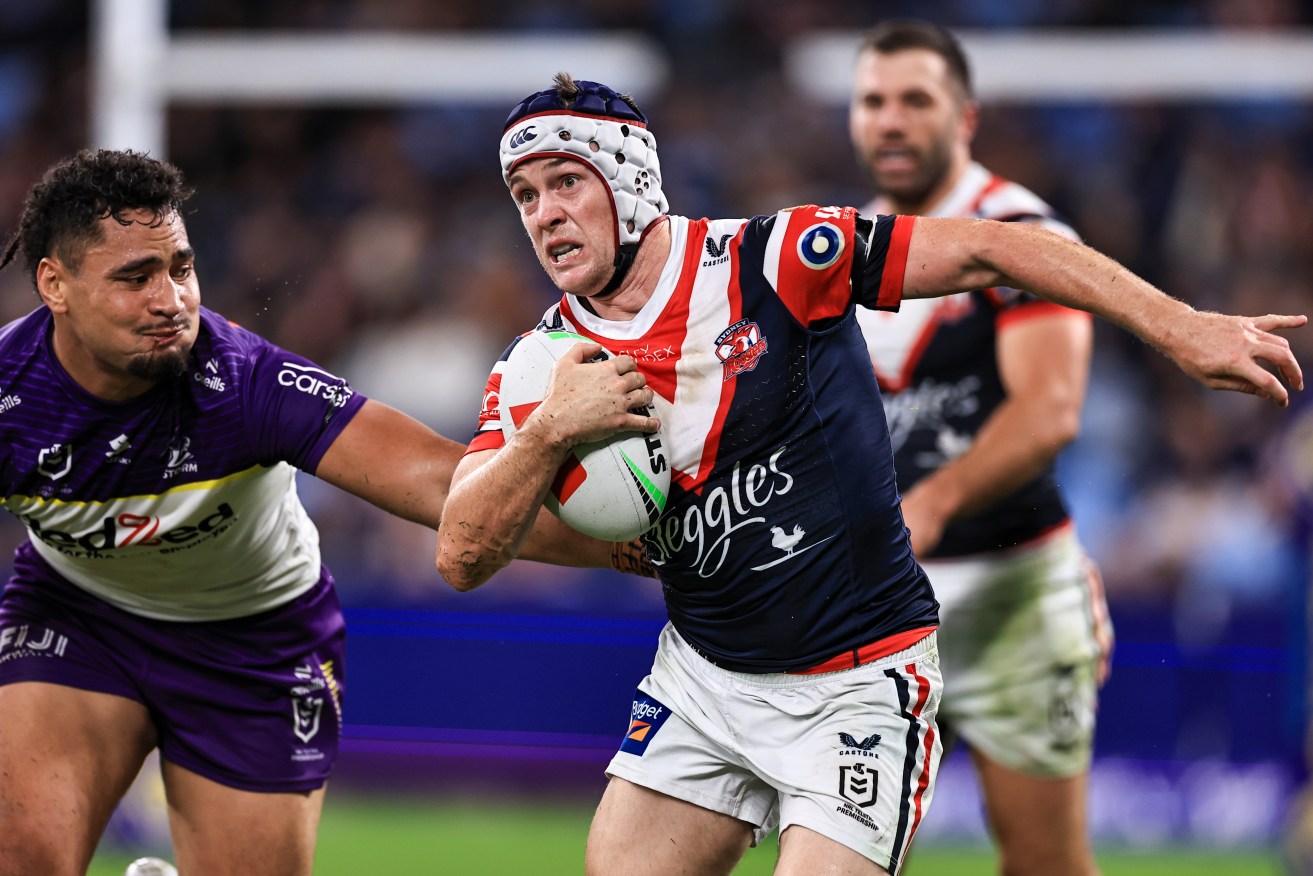 Luke Keary of the Roosters runs with the ball during the NRL Round 7 match between the Sydney Roosters and the Melbourne Storm at Allianz Stadium in Sydney, Thursday, April 18, 2024. (AAP Image/Mark Evans) NO ARCHIVING, EDITORIAL USE ONLY