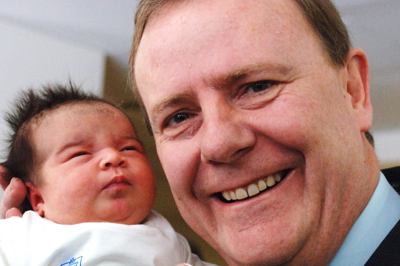Former Federal Treasurer Peter Costello holds 1 day old baby Zarahlinda at the Mercy Hospital for Women in Melbourne, Thursday, Aug 3, 2006. The treasurer was promoting the one every five year national census which will take place next Tuesday night. (AAP Image/Julian Smith)