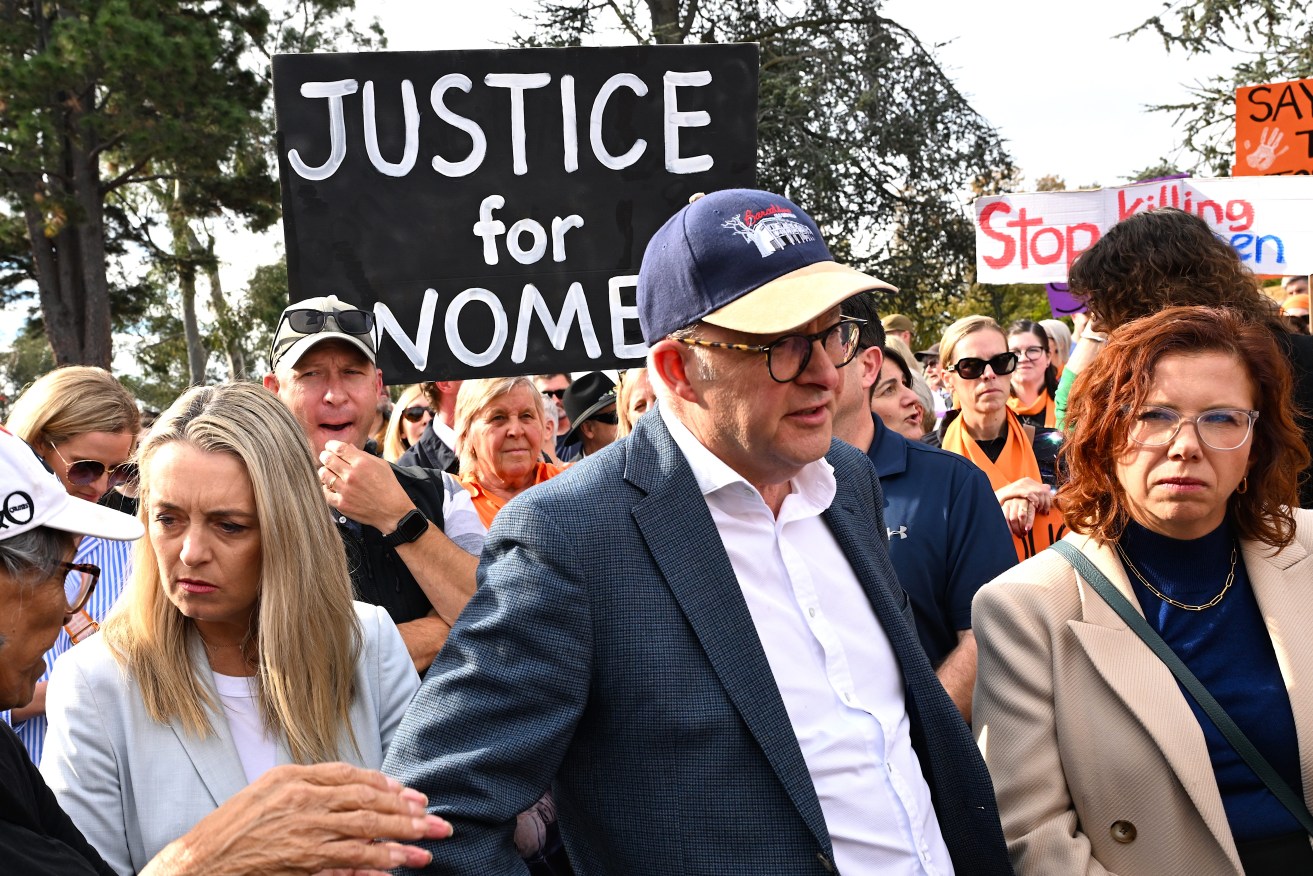 Australian Prime Minister Anthony Albanese attends a rally to a call for action to end violence against women, in Canberra, Sunday, April 28, 2024. (AAP Image/Lukas Coch) 