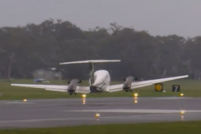 Runway drama as light plane makes belly-landing after landing gear failure