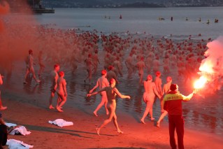 A bit chilly, Willy: Thousands take nude dip to mark solstice